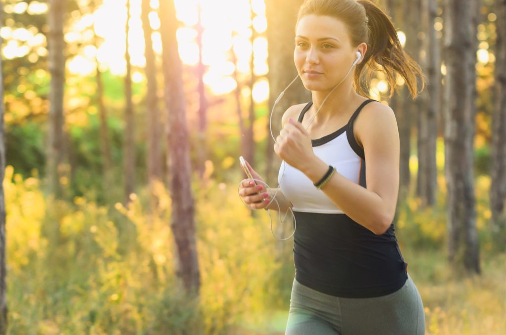 Woman Running to Indicate Adding Exercise to Your Routine