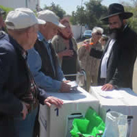 Chabad Rabbi Giving out Food Packages