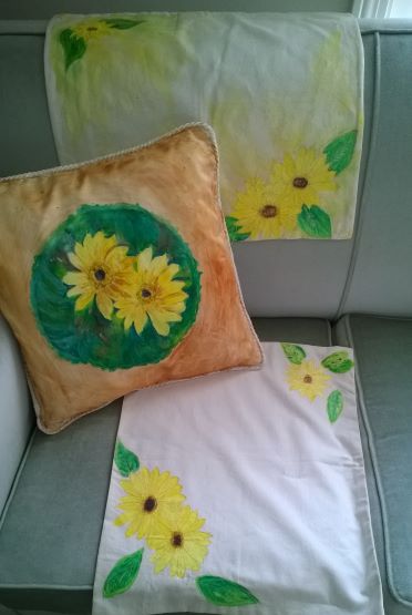 Handpainted cushion cover with matching table mats with friendship flower design